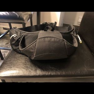 road runner sports belt with 2 large side Pockets and a Front Pouch Adjust Belt